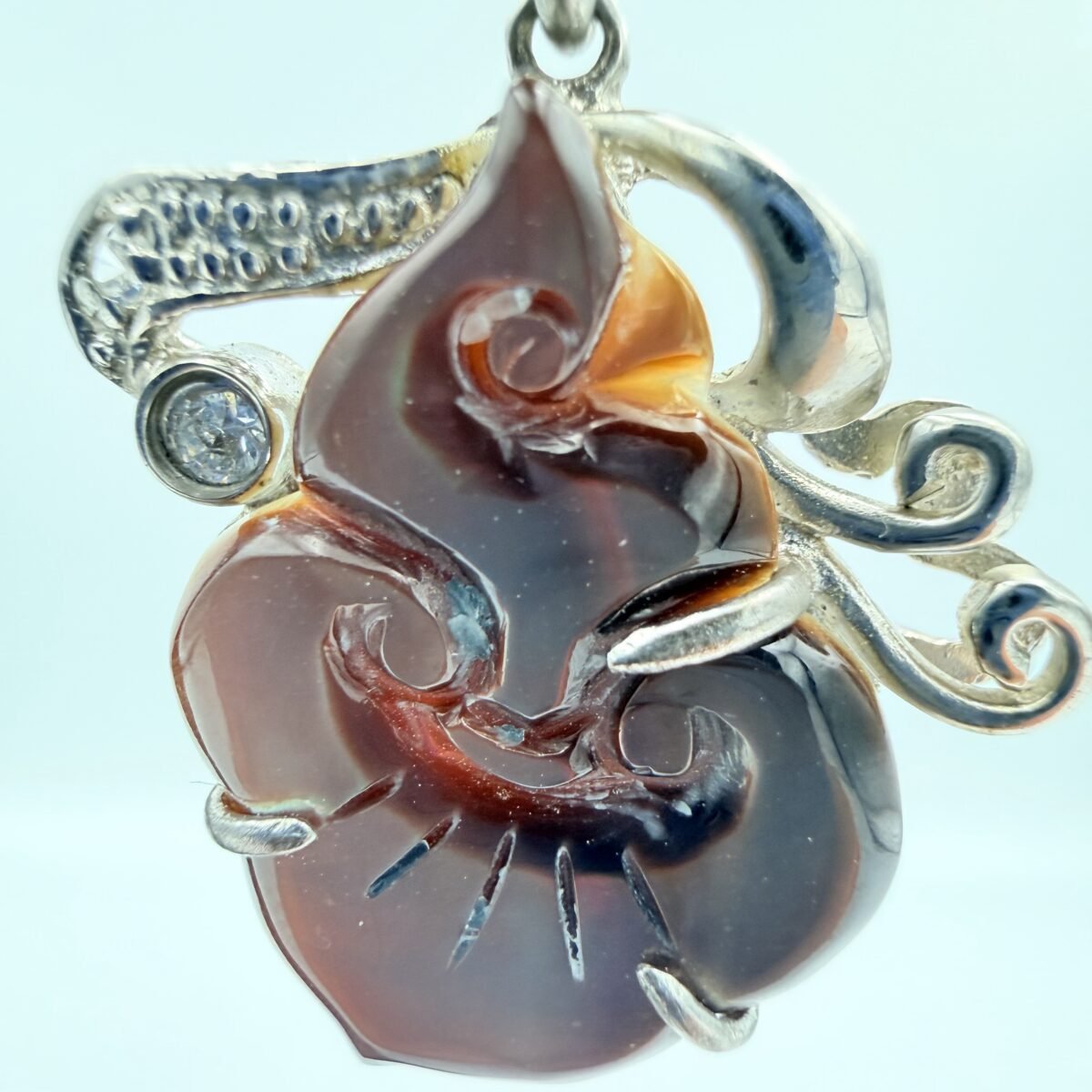 Brown Shell flame pendant
