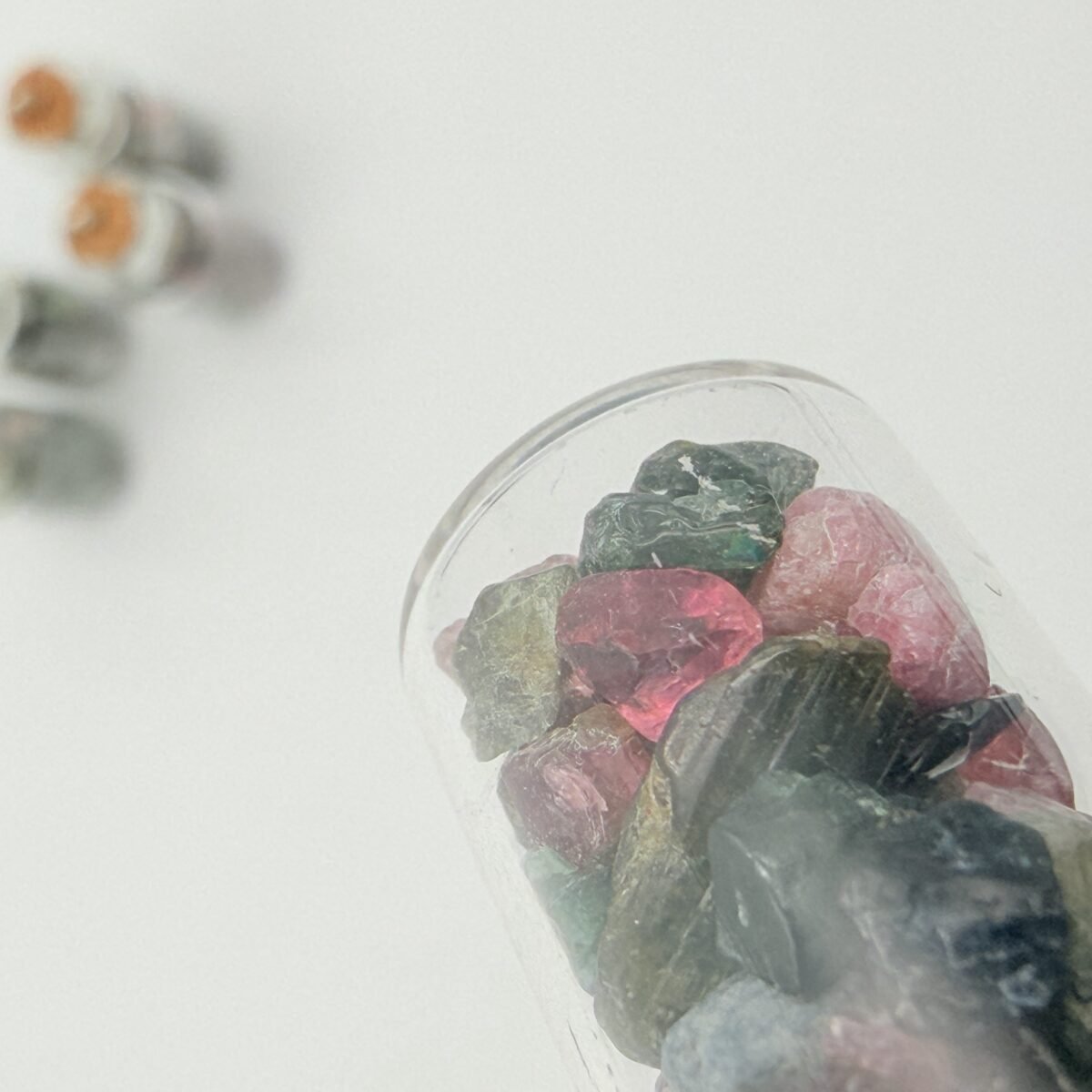Alternative view of Watermelon Tourmaline Rough Stones in Decorative Glass Bottle – Natural Crystal Specimen