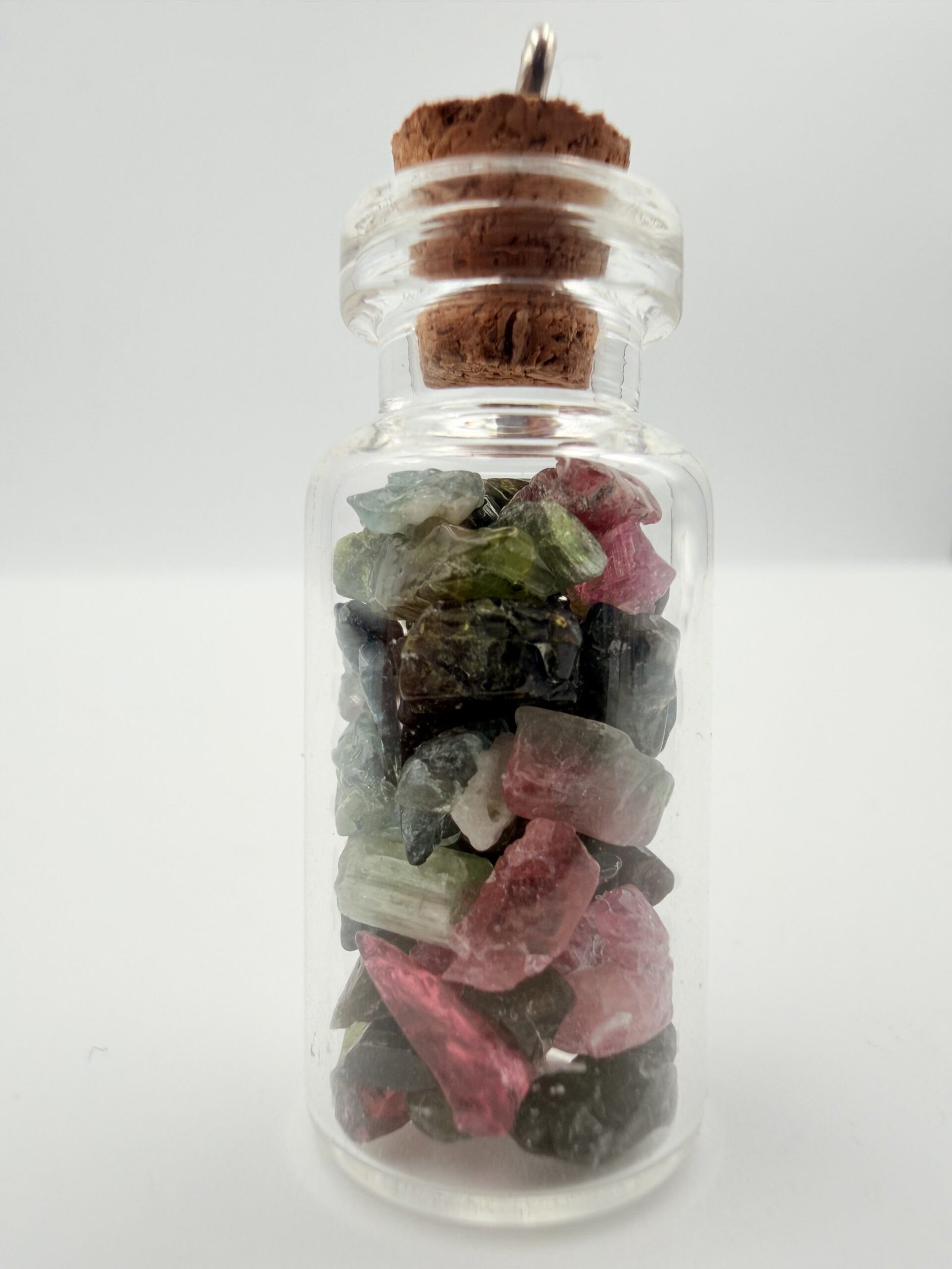 Watermelon Tourmaline Rough Stones in Decorative Glass Bottle – Natural Crystal Specimen